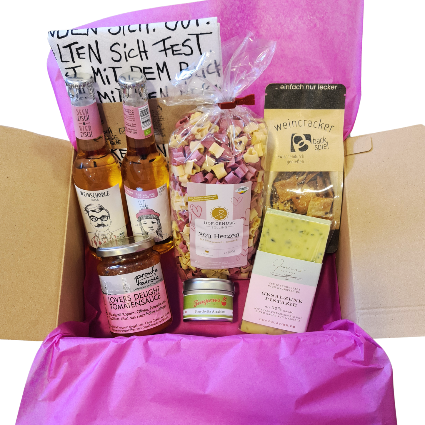 Geschenkset „Zeit zu zweit" drapiert im Versandkarton 